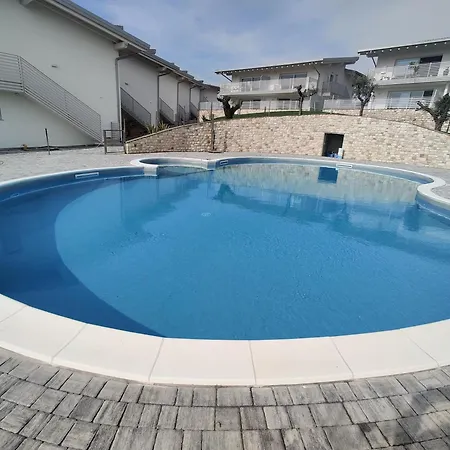 Bilocale In Vista Con Piscina アパート ポルペナッツェ・デル・ガルダ